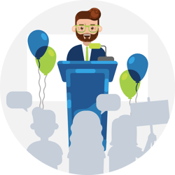 Man standing at a podium with balloons and an audience in front of him