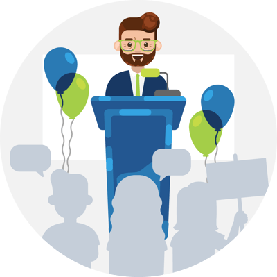 Man standing at a podium with balloons and an audience in front of him